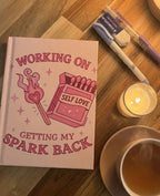 Hardcover Journal — "Working On Getting My Spark Back" Self-Love Pink Notebook for Mental Wellness & Gratitude Printify